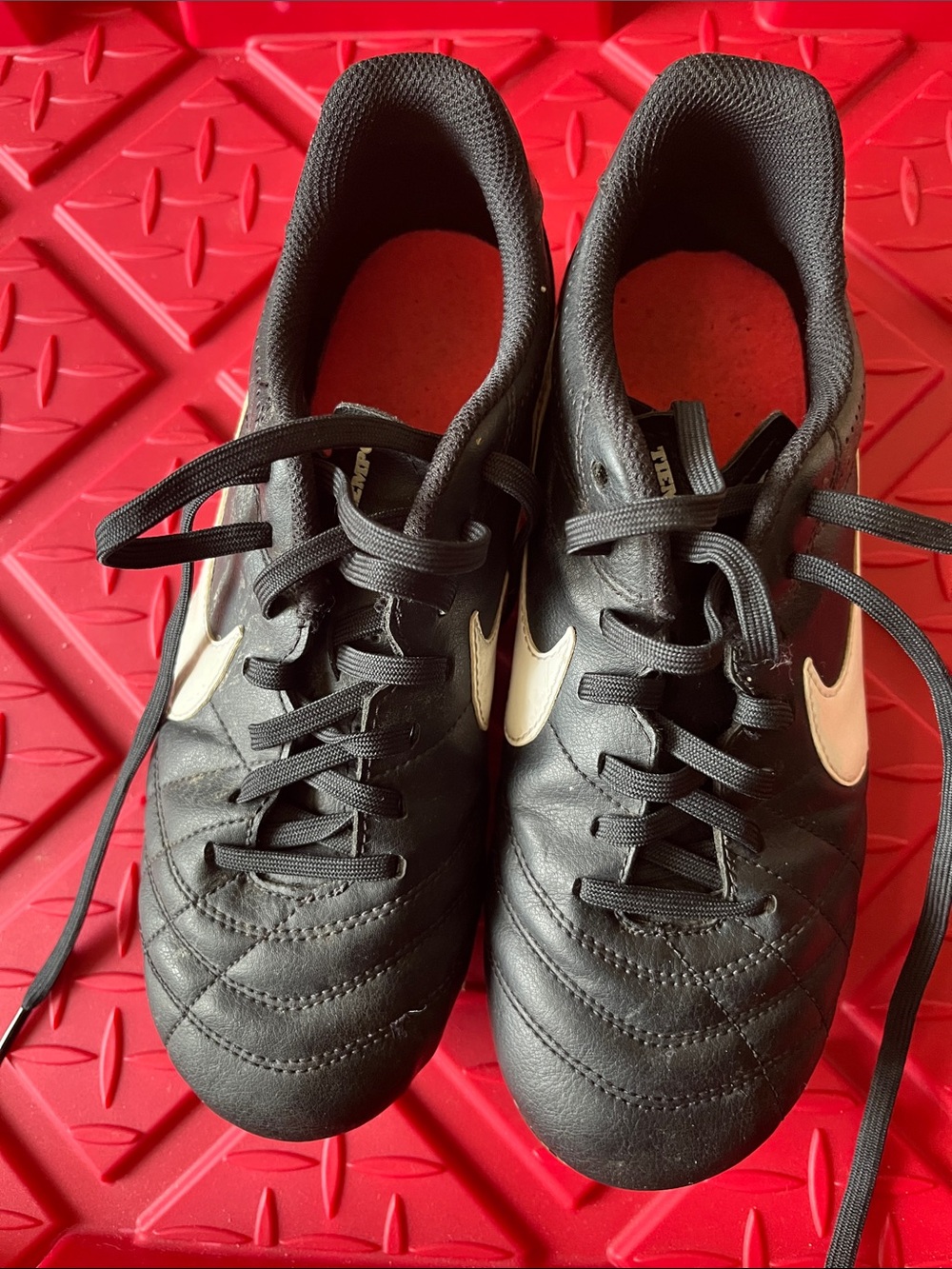 Nike Black Youth Soccer cleats size 7 with White Swoosh